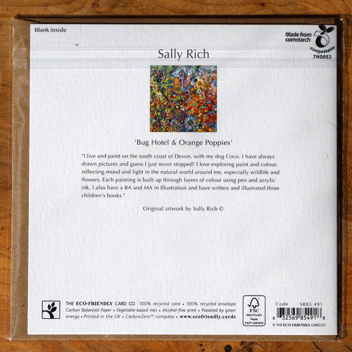 Back of an Eco Paper Card product package for Sally Rich's 'Bug Hotel & Orange Poppies' artwork, showing the artist's colorful painting, text, barcode, and certification logos on a white card inside a brown cardboard sleeve.